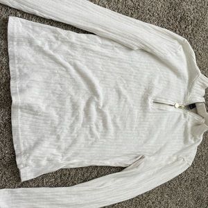 A White Top With A Unzippable Top Half